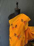 Orange Doll Embroidered Mulmul Saree