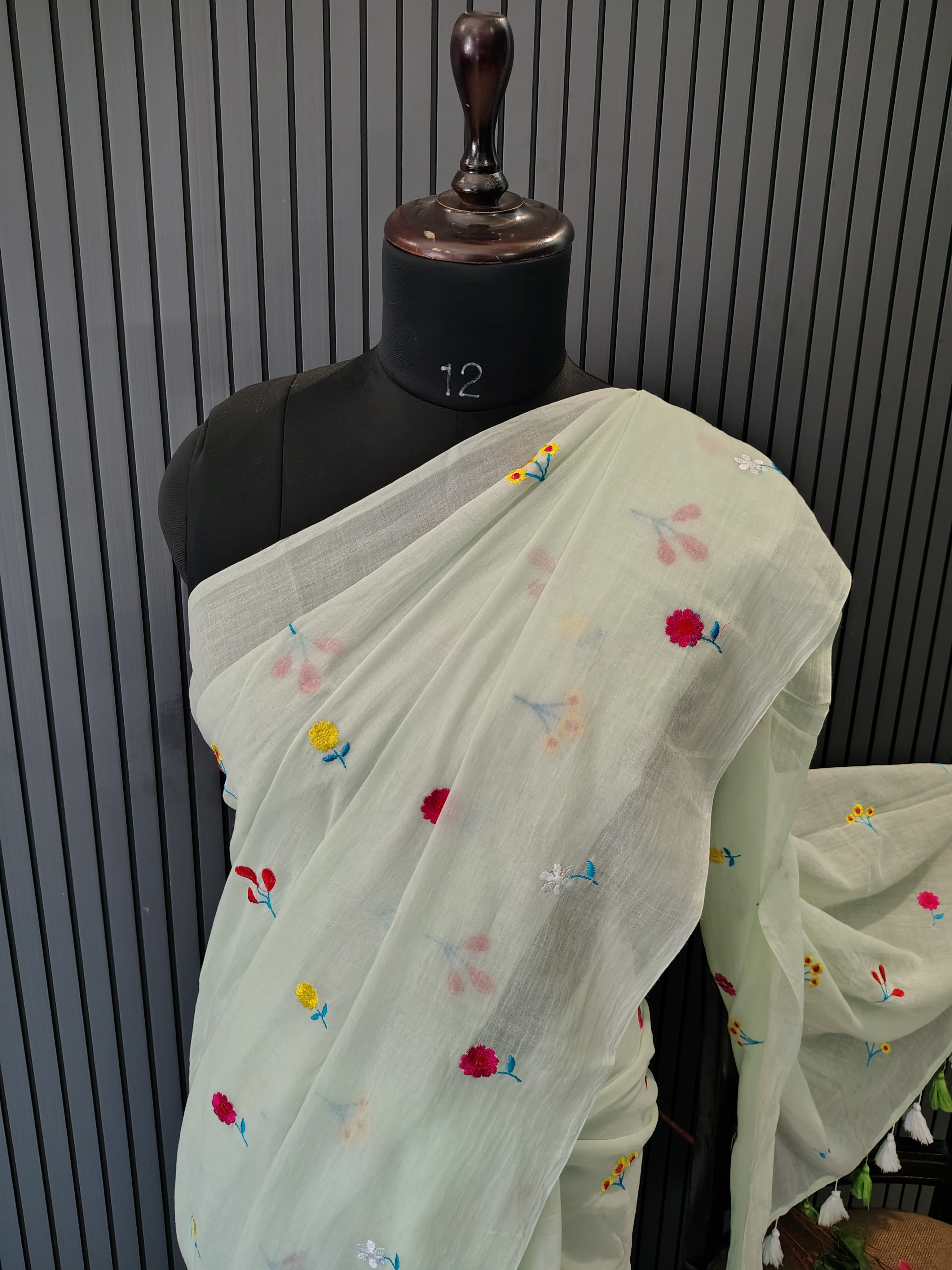 Mint Green Multiflower Embroidery Mulmul Saree
